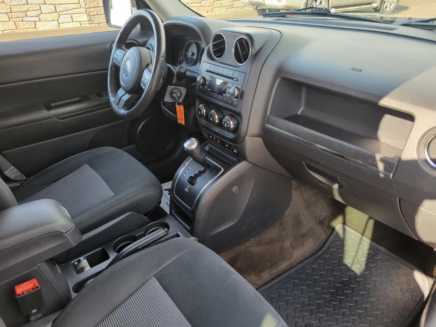 2014 Blue /Black Jeep Patriot Latittude (1C4NJRFB7ED) with an 2.4L I4 engine, 6 Speed Automatic transmission, located at 450 N Russell, Missoula, MT, 59801, (406) 543-6600, 46.874496, -114.017433 - Photo#8